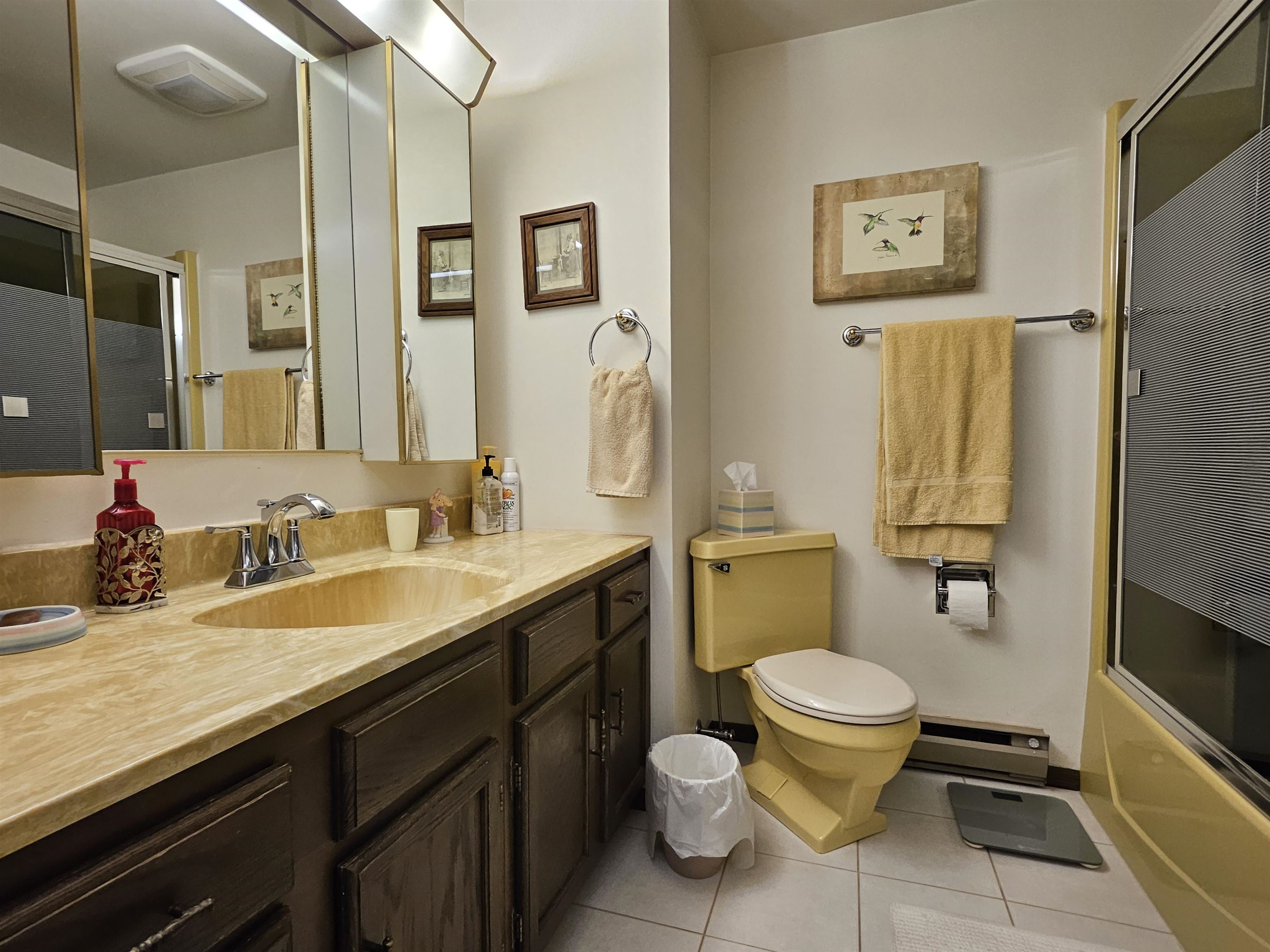 2155 Oriole Drive Freeport, IL 61032 - Photo 8 of 20 a bathroom with a granite countertop toilet sink and mirror
