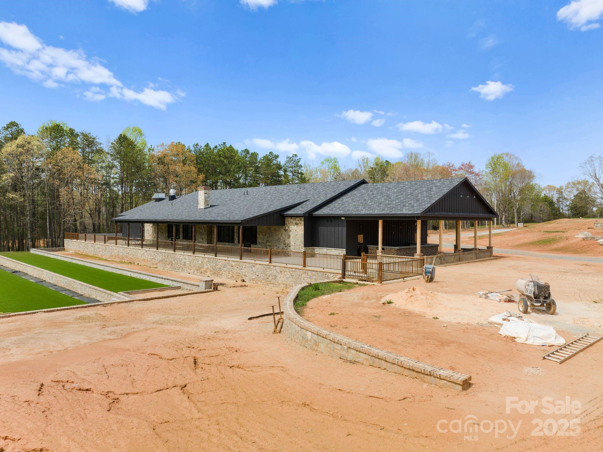 1565 Shinnville Road Cleveland, NC 27013 - Photo 13 of 48 a view of a house with pool and chairs