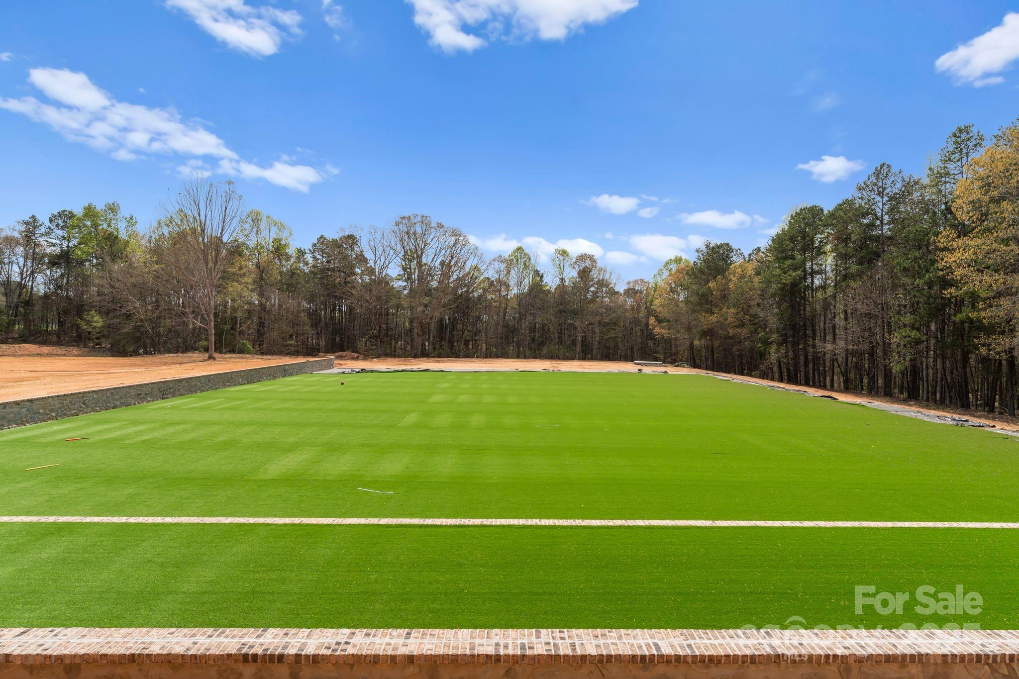 1565 Shinnville Road Cleveland, NC 27013 - Photo 15 of 48 a view of a tennis court