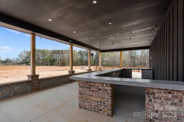a kitchen with a large window