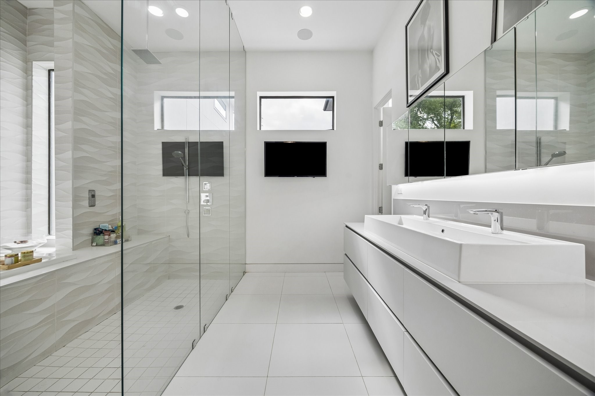 2014 Park Street Houston, TX 77019 - Photo 23 of 40 Luxurious primary retreat. Floating cabinetry, Wet room with steam shower and soaking tub.