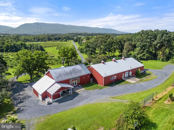 an aerial view of a house with a garden