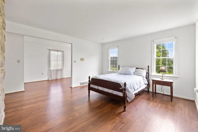 a view of a field with an trees