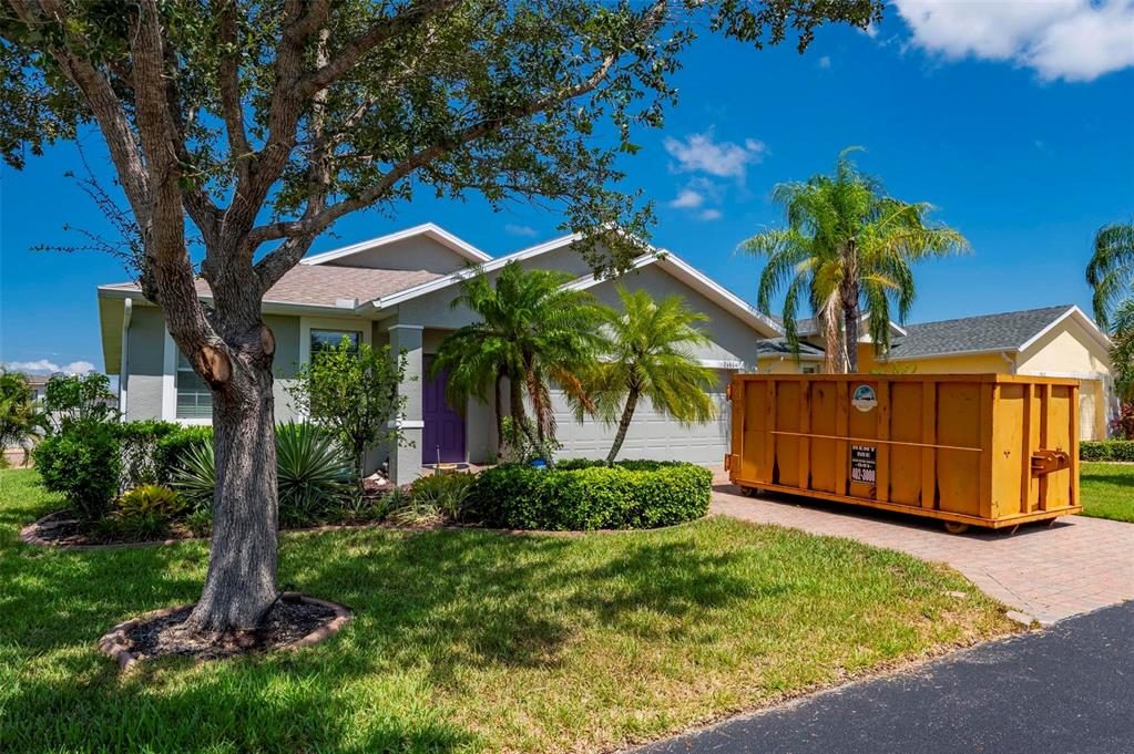 24604 Rio Villa Lakes Circle Punta Gorda, FL 33950 - Photo 8 of 28 a front view of a house with garden