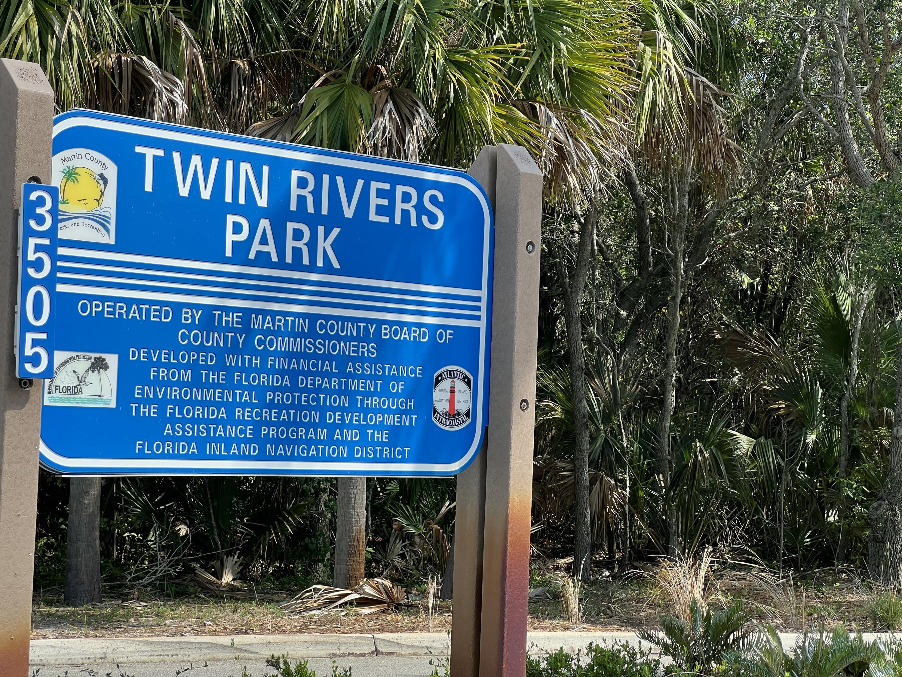 4292 Southeast Rainbows End Stuart, FL 34997 - Photo 50 of 53 a sign that is on the side of a road