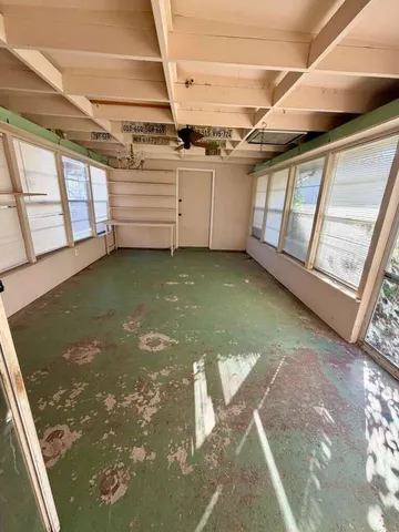 a view of pool with tree s