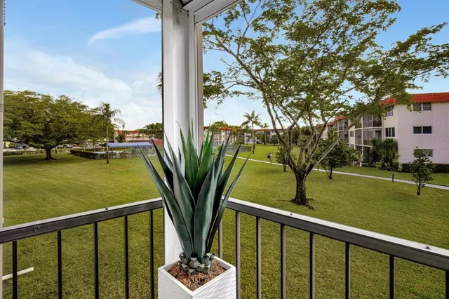 a view of a porch with a yard