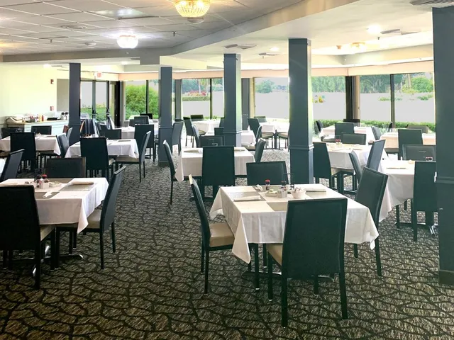 a room with gym equipment and a window