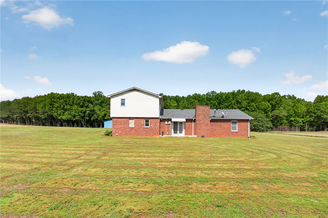145 State Rd S-4-935 Pendleton, SC 29670 - Photo 24 of 47 A spacious yard surrounds this brick home, offering ample outdoor enjoyment.