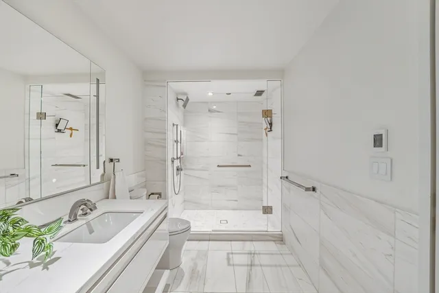 a view of swimming pool with seating area