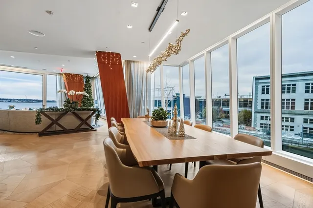 a balcony with furniture and city view