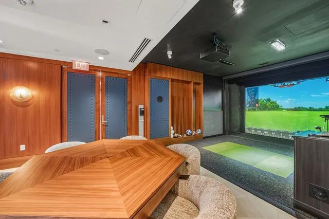 a kitchen with a table and a stove