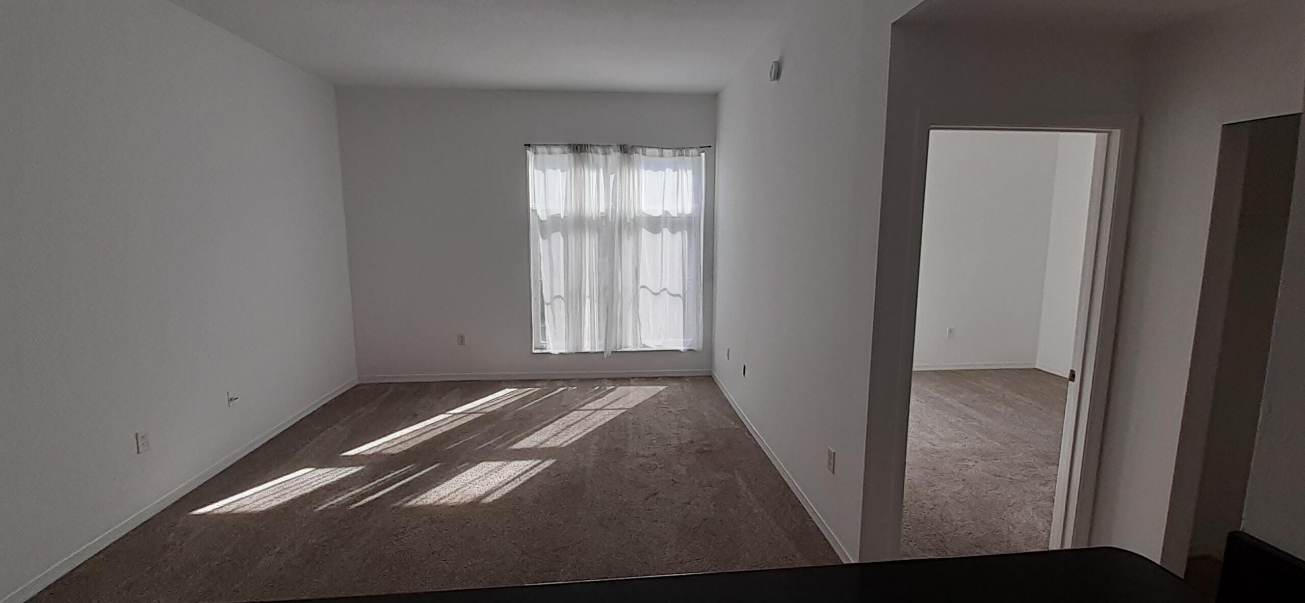 Undisclosed Address Jupiter, FL 33458 - Photo 2 of 6 310 LR BR from kitchen