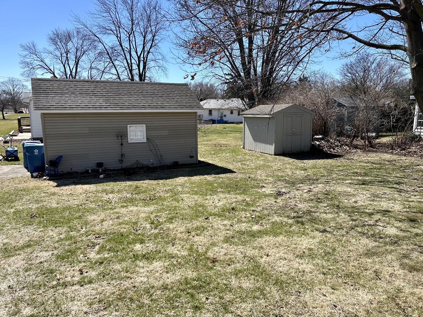 1708 Stroble Avenue Mendota, IL 61342 - Photo 7 of 8 a view of a backyard with large trees
