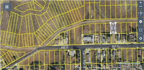 en suite bathroom with a window and wooden floor