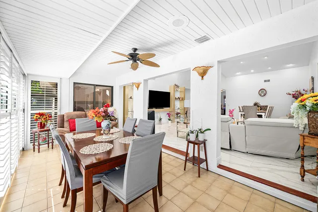 a bathroom with a toilet a sink and a mirror
