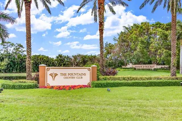 an aerial view of a house with a swimming pool