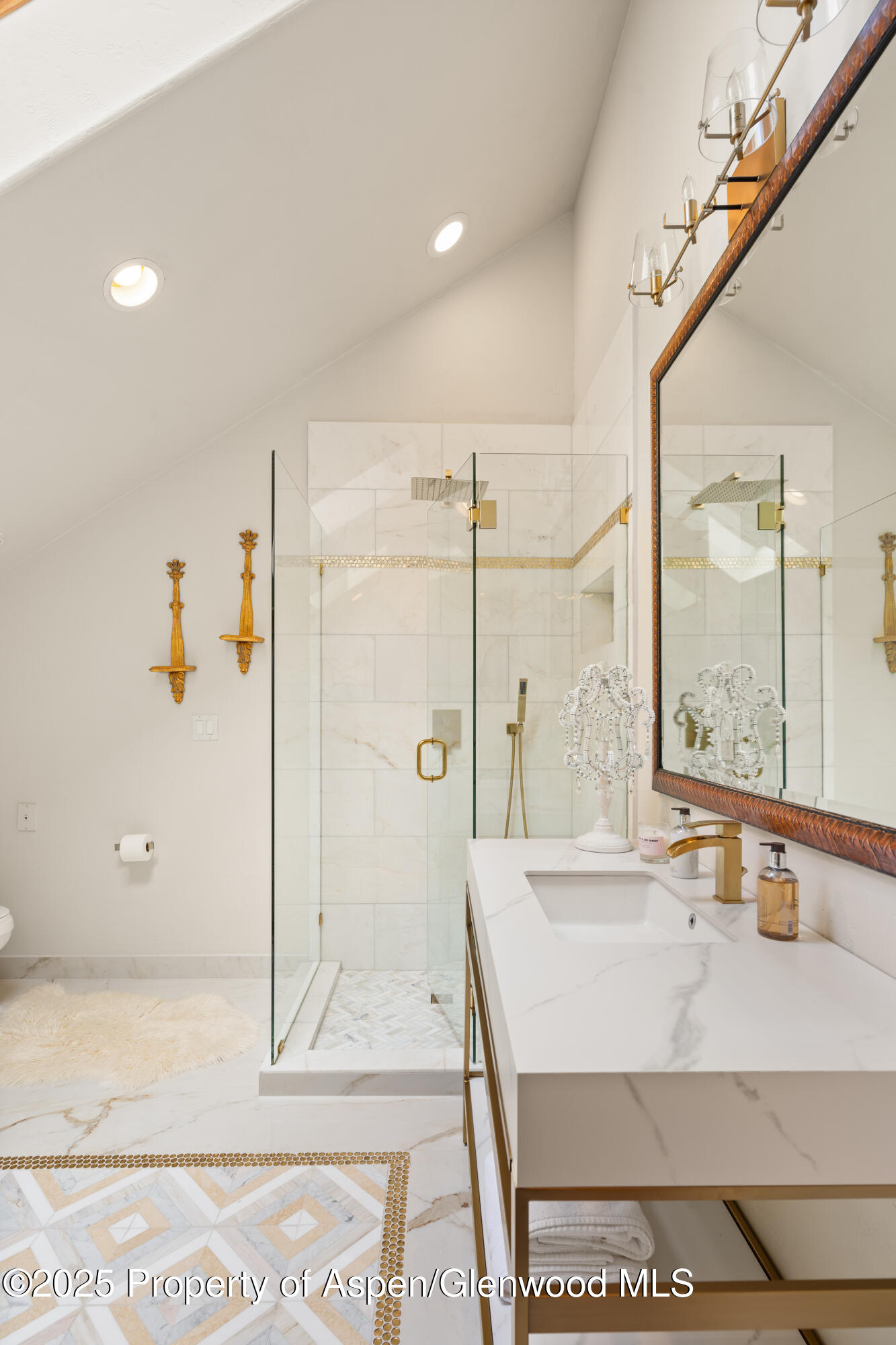 189 Light Hill Road Snowmass, CO 81654 - Photo 23 of 44 a bathroom with a sink and a mirror