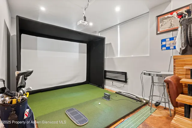 a room with furniture and a flat screen tv