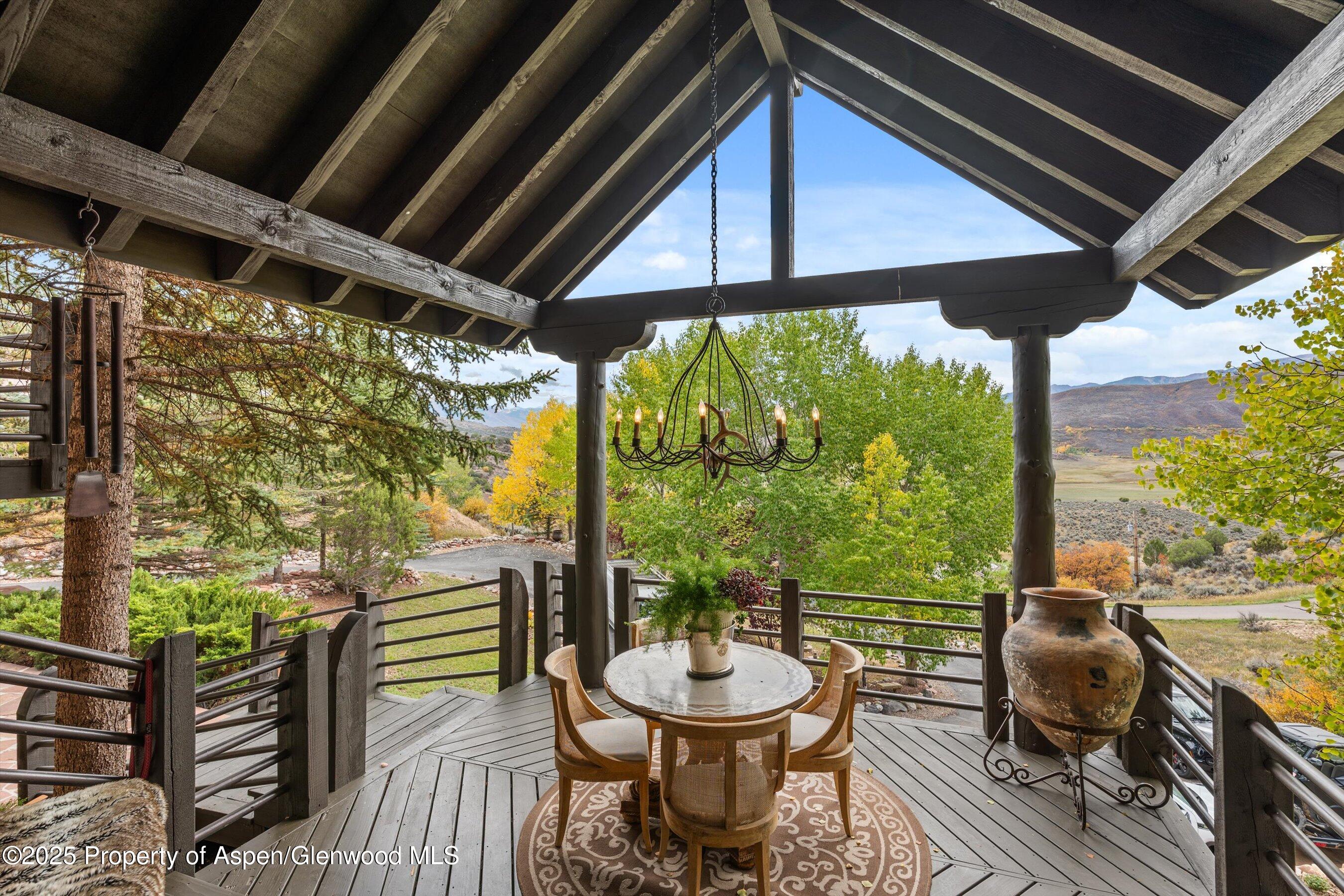 189 Light Hill Road Snowmass, CO 81654 - Photo 31 of 44 a outdoor living space with furniture and garden view