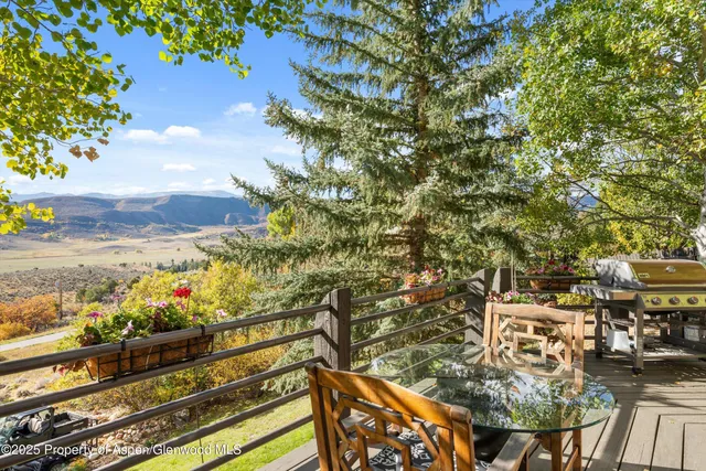 a view of a patio with swimming pool