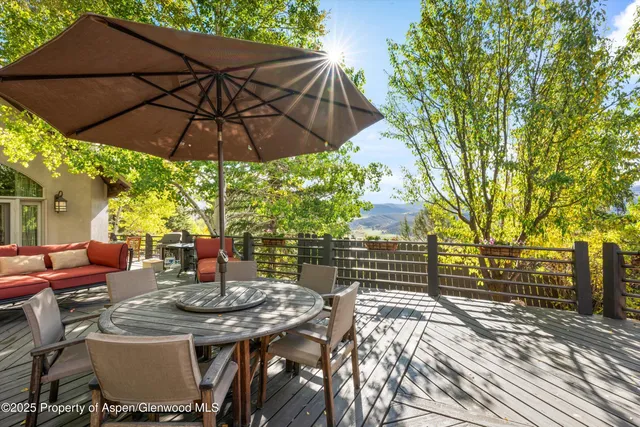a view of outdoor space yard deck patio and outdoor kitchen