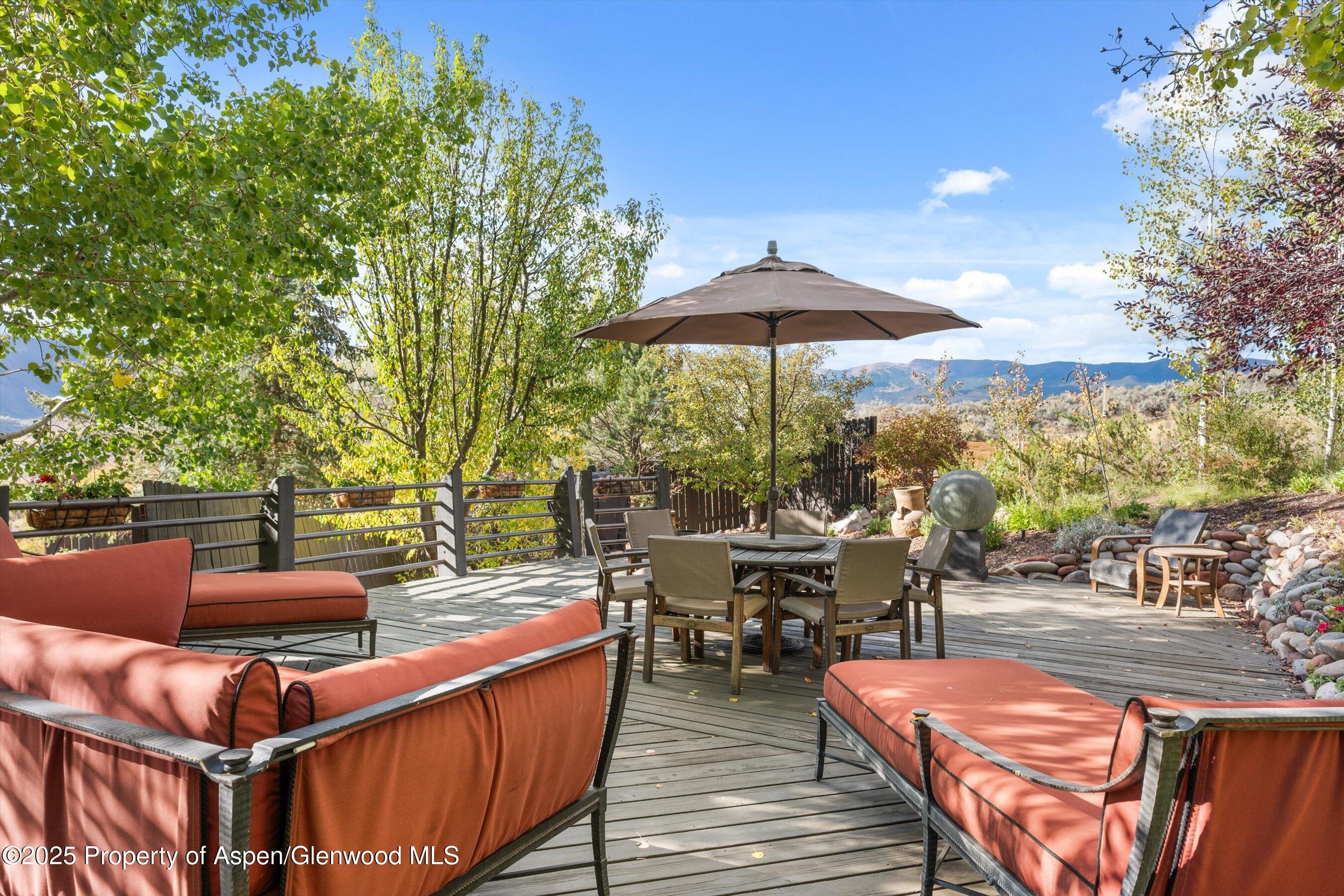 189 Light Hill Road Snowmass, CO 81654 - Photo 38 of 44 a view of outdoor space yard deck patio and outdoor kitchen