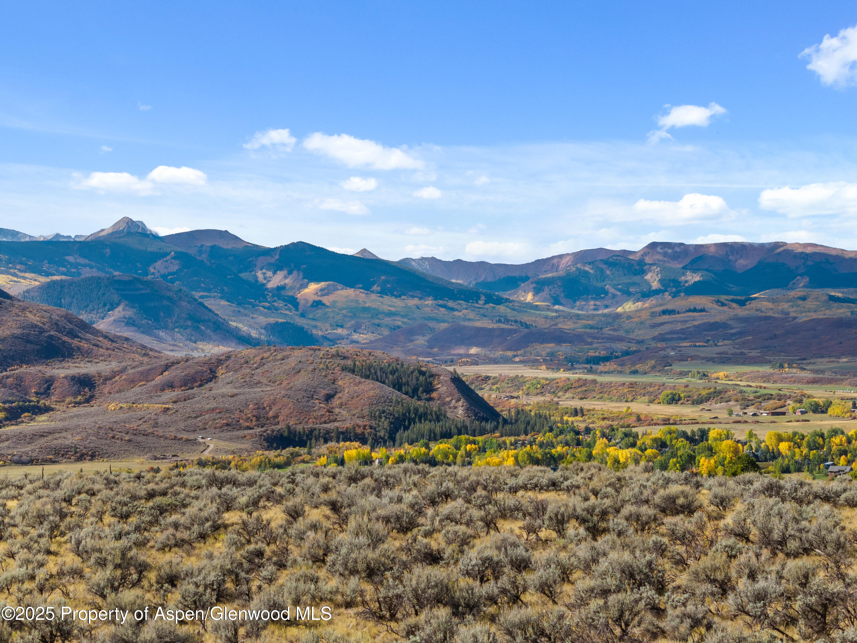 189 Light Hill Road Snowmass, CO 81654 - Photo 43 of 44 a view of an ocean and a mountain