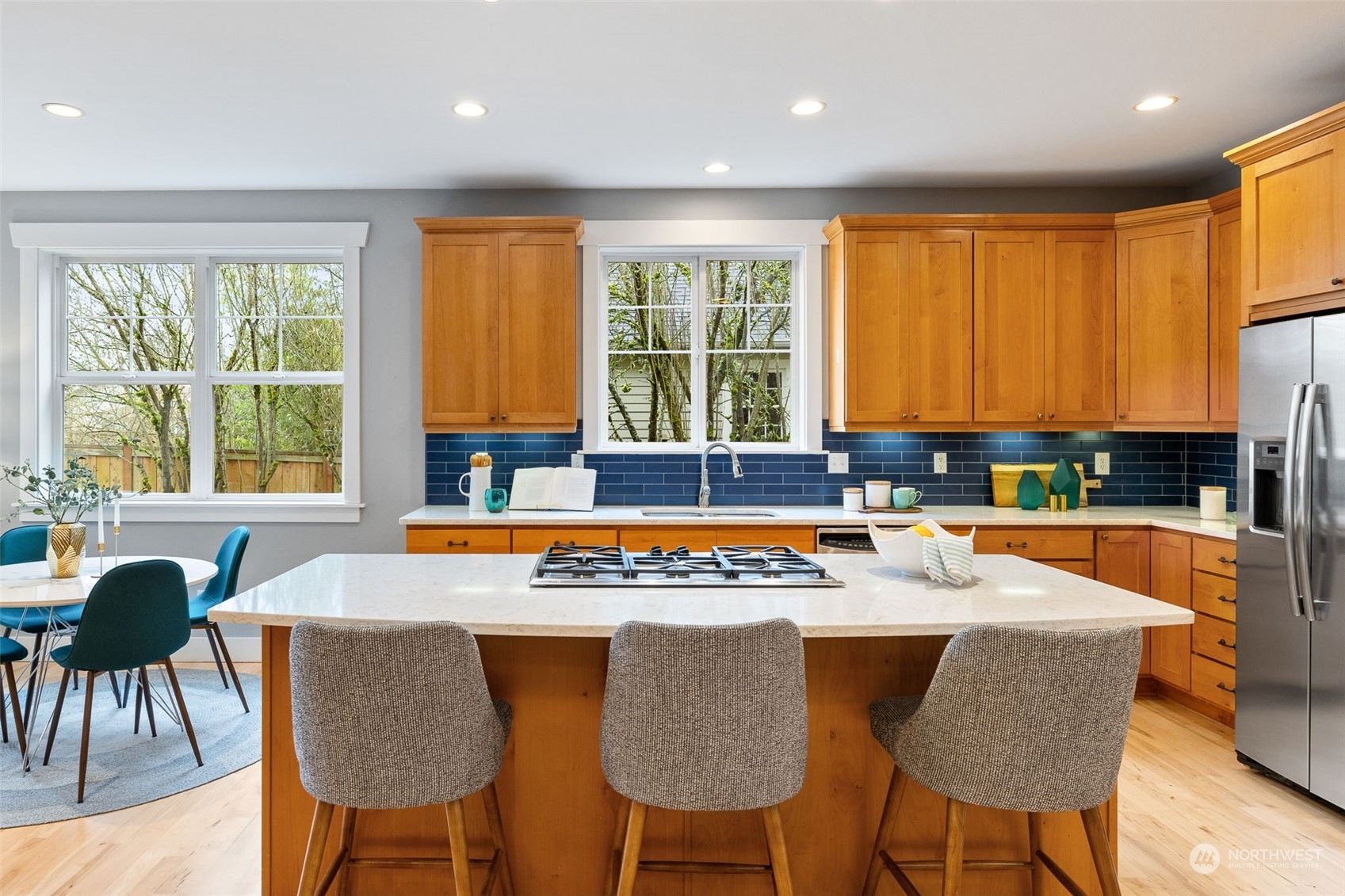 740 North 78th Street Seattle, WA 98103 - Photo 15 of 40 a view of a dining room with furniture and a large window
