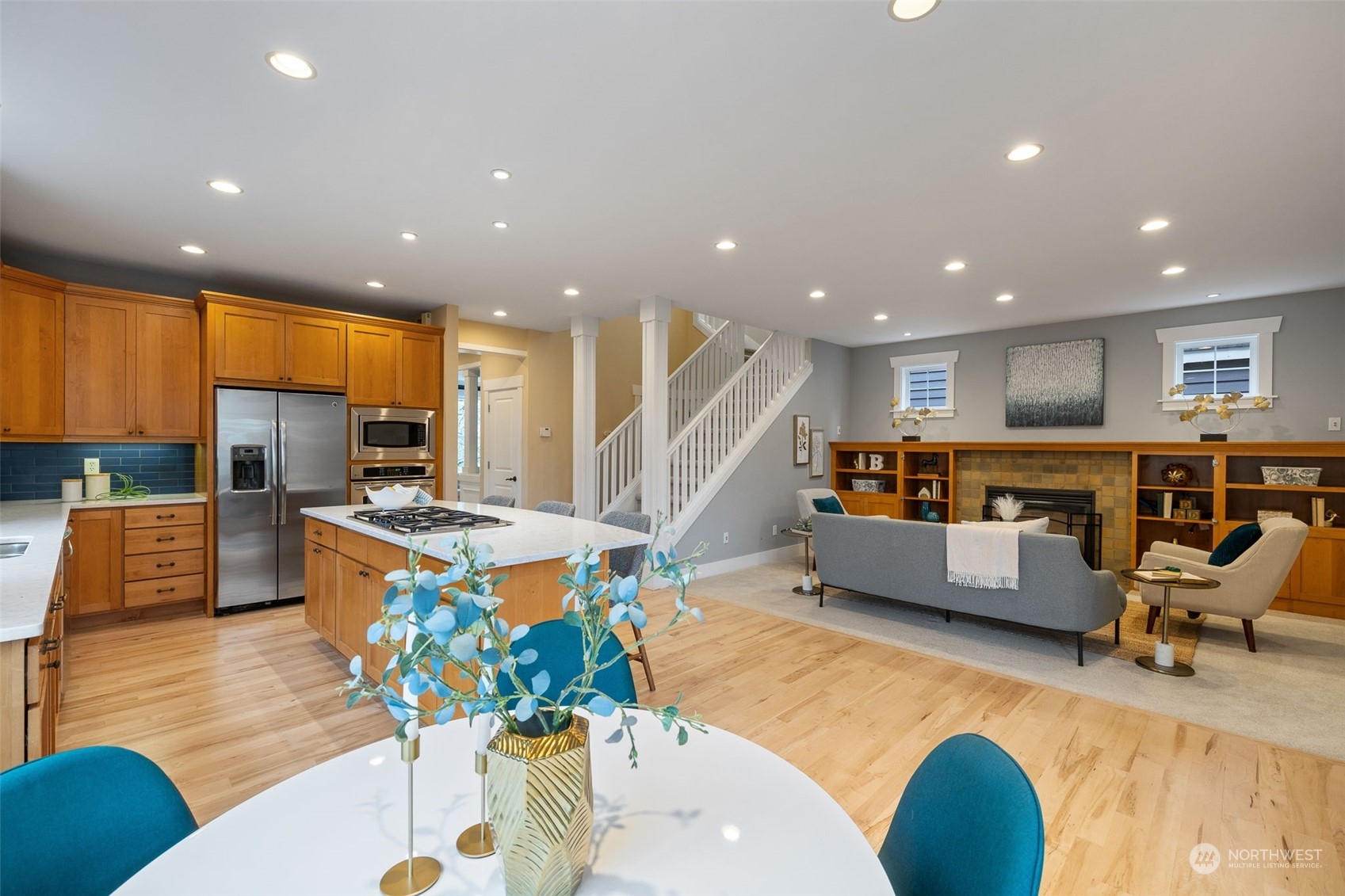 740 North 78th Street Seattle, WA 98103 - Photo 17 of 40 a living room with furniture kitchen view and a large window