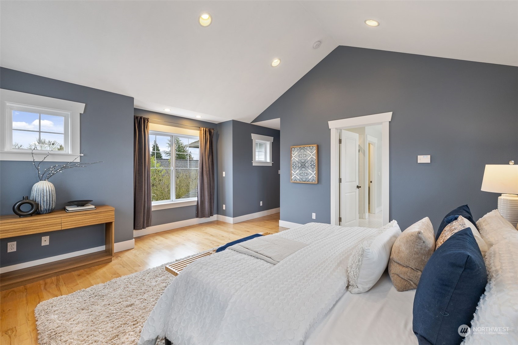 740 North 78th Street Seattle, WA 98103 - Photo 33 of 40 a bedroom with a bed and a couch