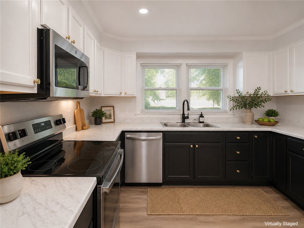 3517 Shawnee Avenue Anderson, SC 29626 - Photo 4 of 25 Culinary delights await in this modern kitchen with sleek countertops and ample cabinetry.
