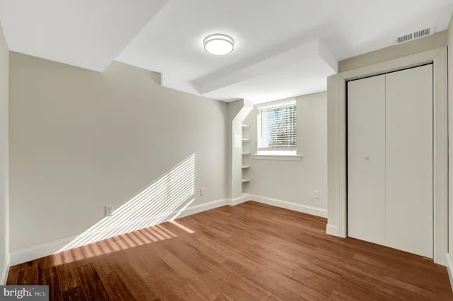 a view of a swimming pool with an outdoor space and seating area