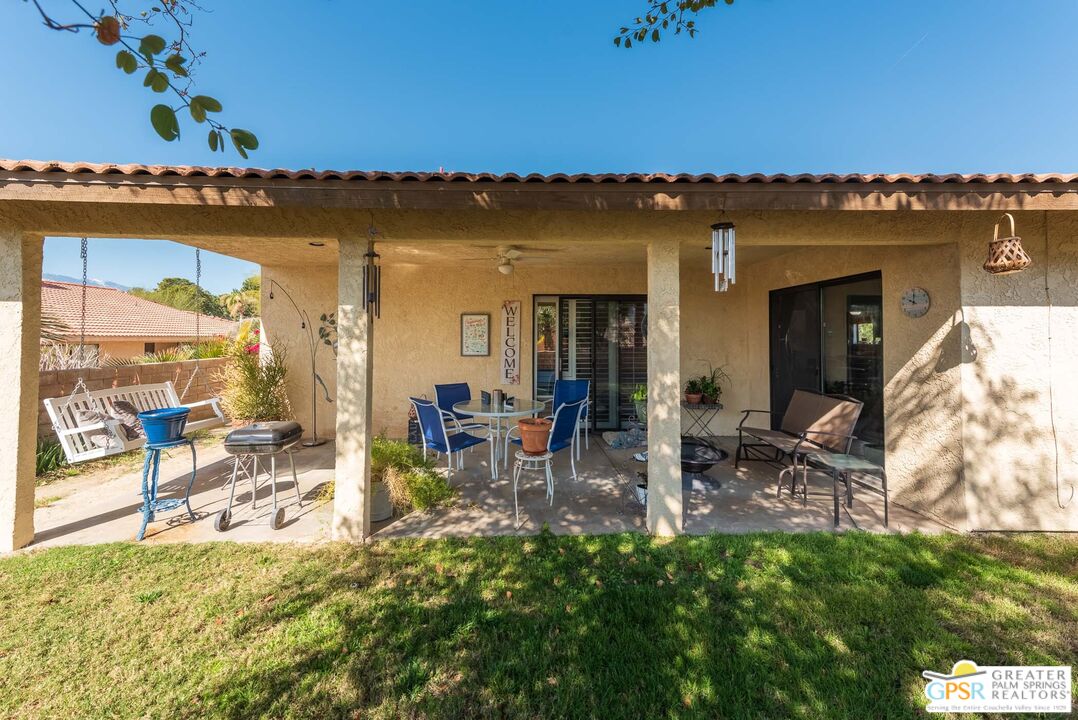 9760 Capiland Road Desert Hot Springs, CA 92240 - Photo 16 of 16 a view of swimming pool with outdoor seating