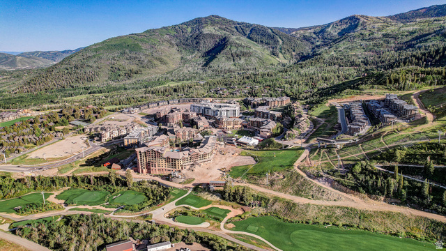 2417 West High Road, Unit 2515 Park City, UT 84098 - Photo 52 of 67 Aerial overview of property's location featuring a mountain backdrop and a golf course
