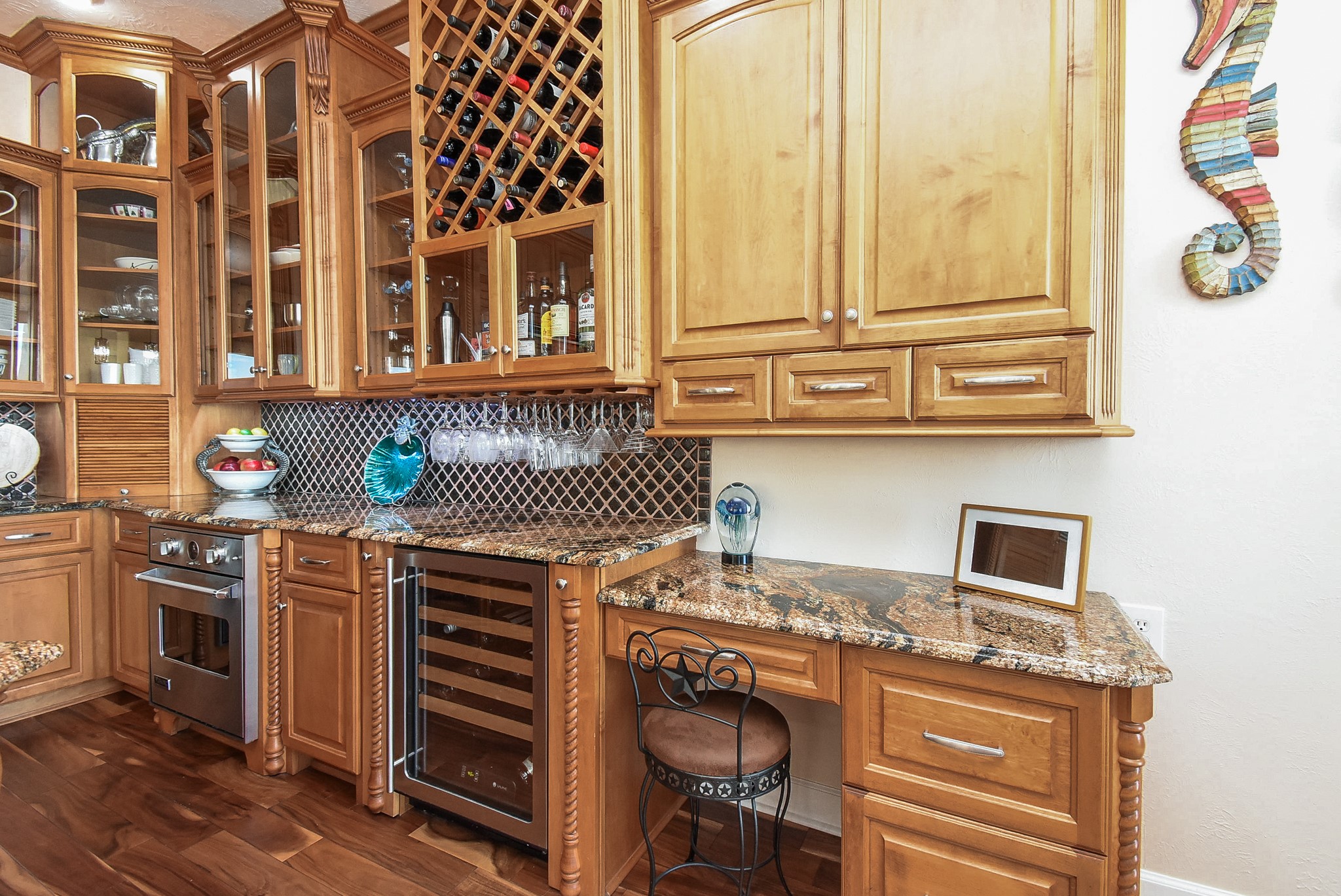 313 Harborside Circle Kemah, TX 77565 - Photo 12 of 35 a kitchen with a stove and a microwave