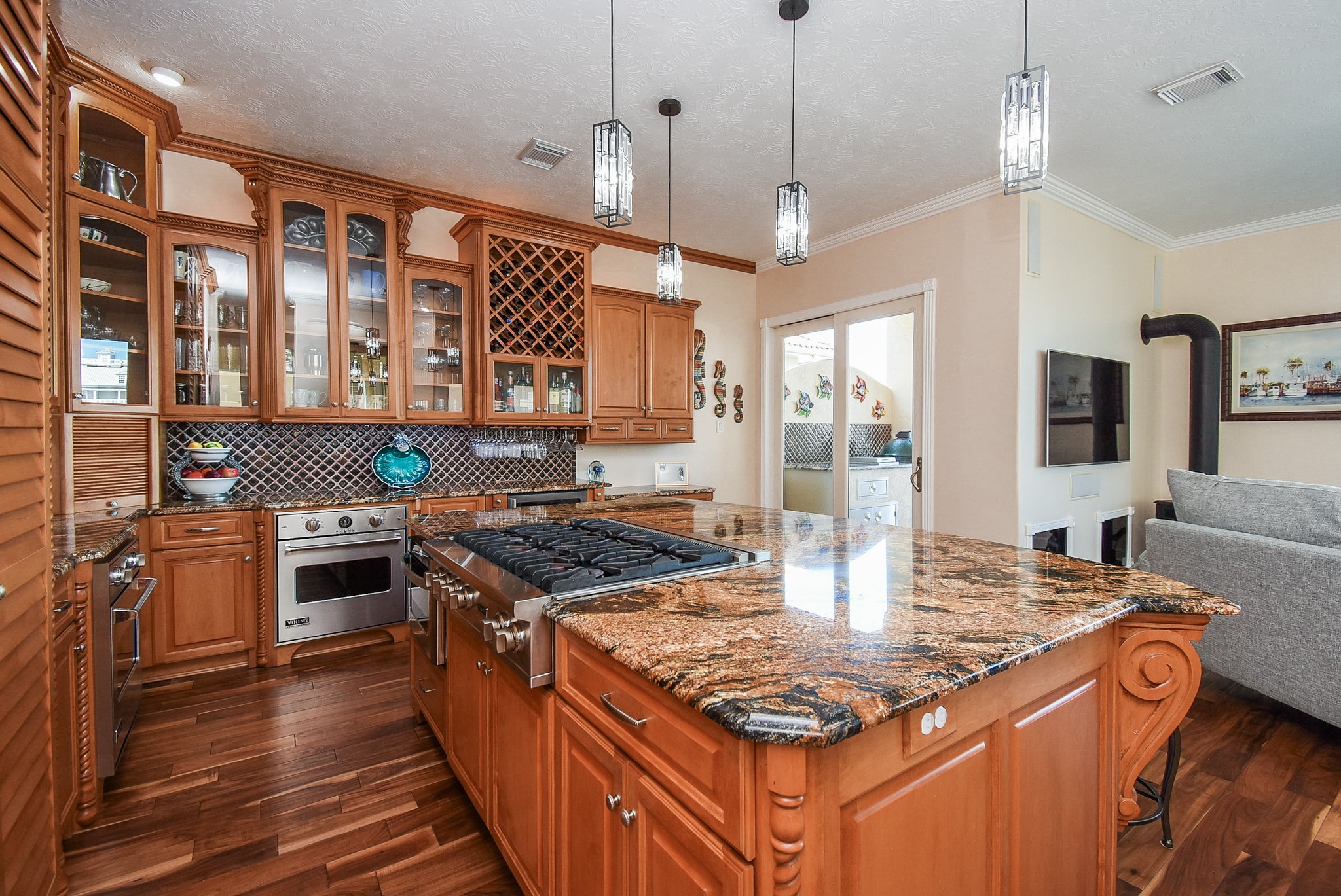 313 Harborside Circle Kemah, TX 77565 - Photo 13 of 35 a kitchen with stainless steel appliances granite countertop a stove and a refrigerator