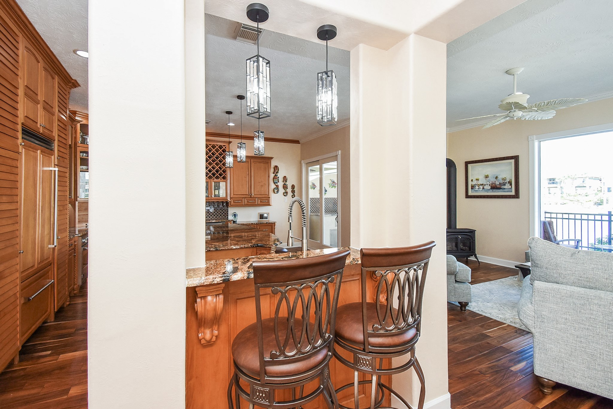 313 Harborside Circle Kemah, TX 77565 - Photo 15 of 35 a view of a dining room with furniture window and wooden floor