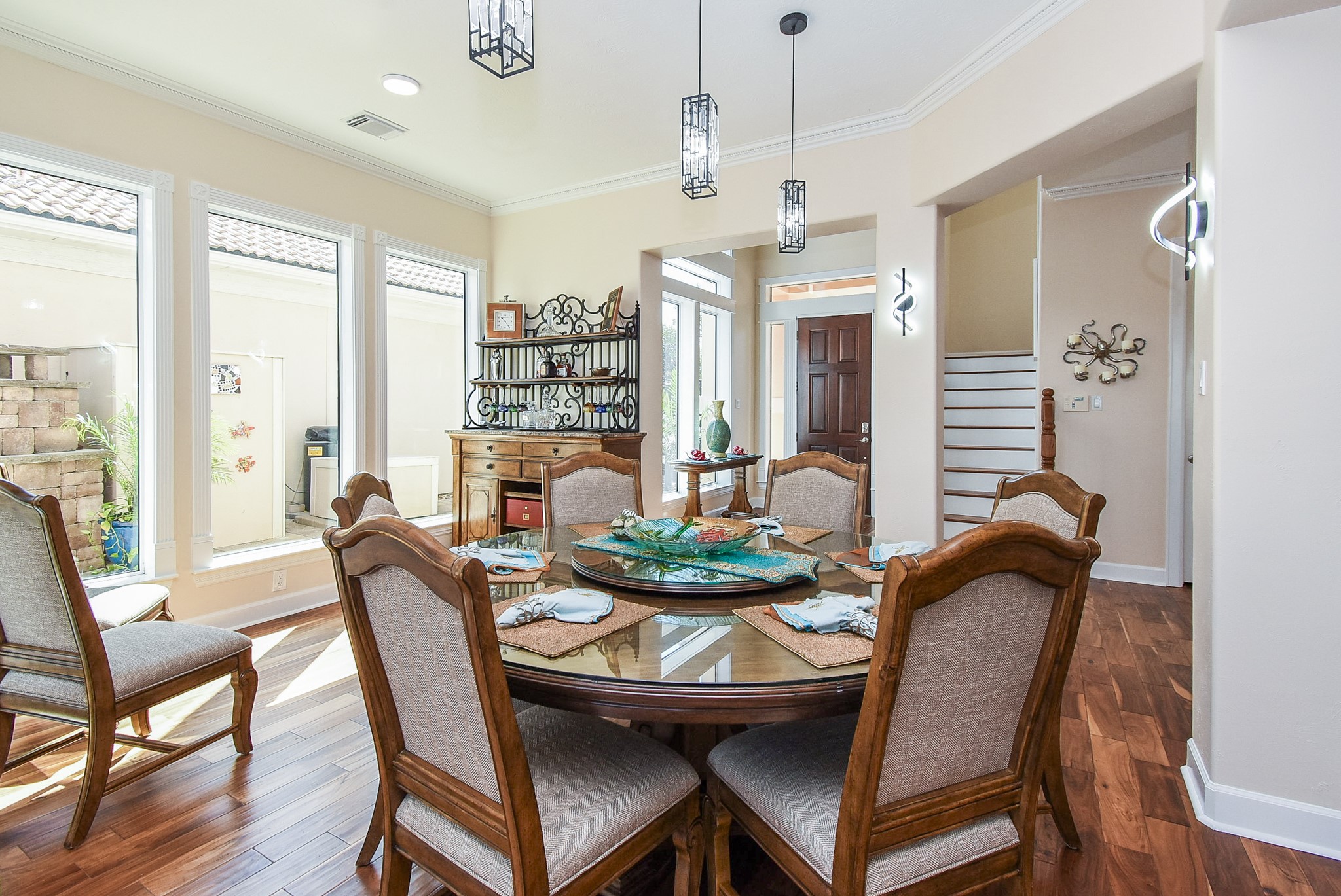 313 Harborside Circle Kemah, TX 77565 - Photo 17 of 35 a view of a dining room with furniture window and wooden floor