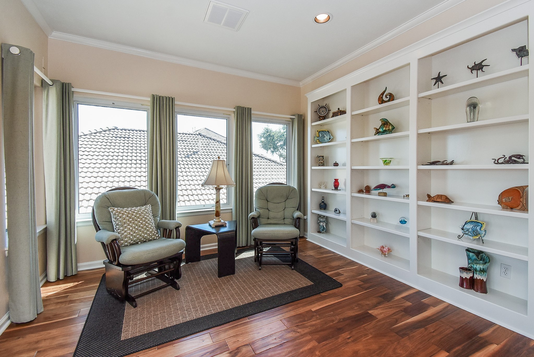 313 Harborside Circle Kemah, TX 77565 - Photo 20 of 35 a living room with furniture cabinets and wooden floor