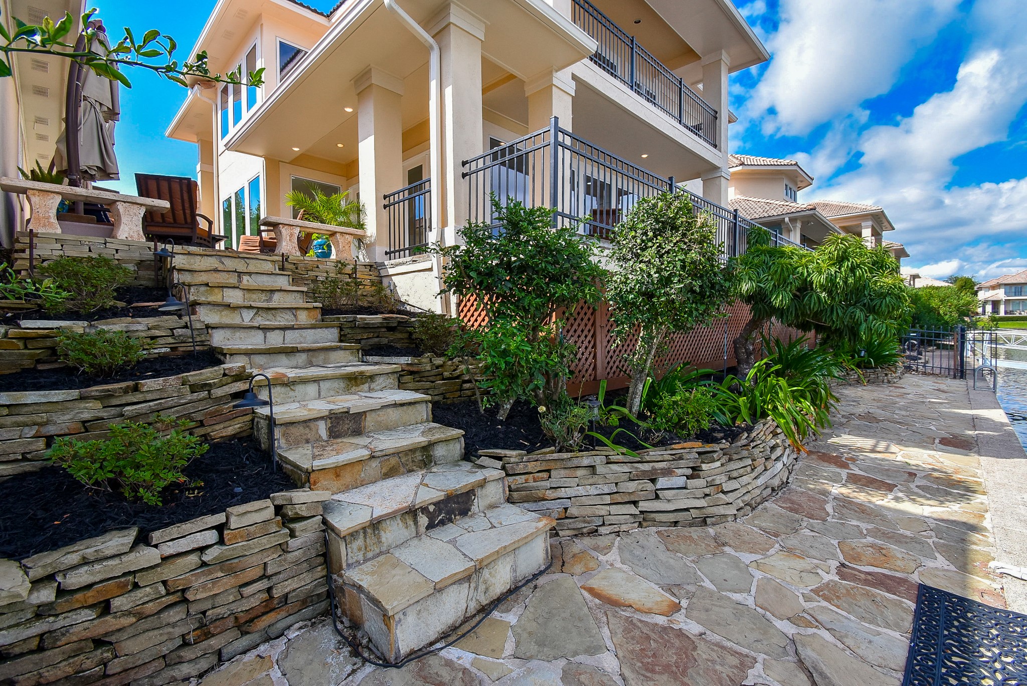 313 Harborside Circle Kemah, TX 77565 - Photo 32 of 35 a view of a building with garden