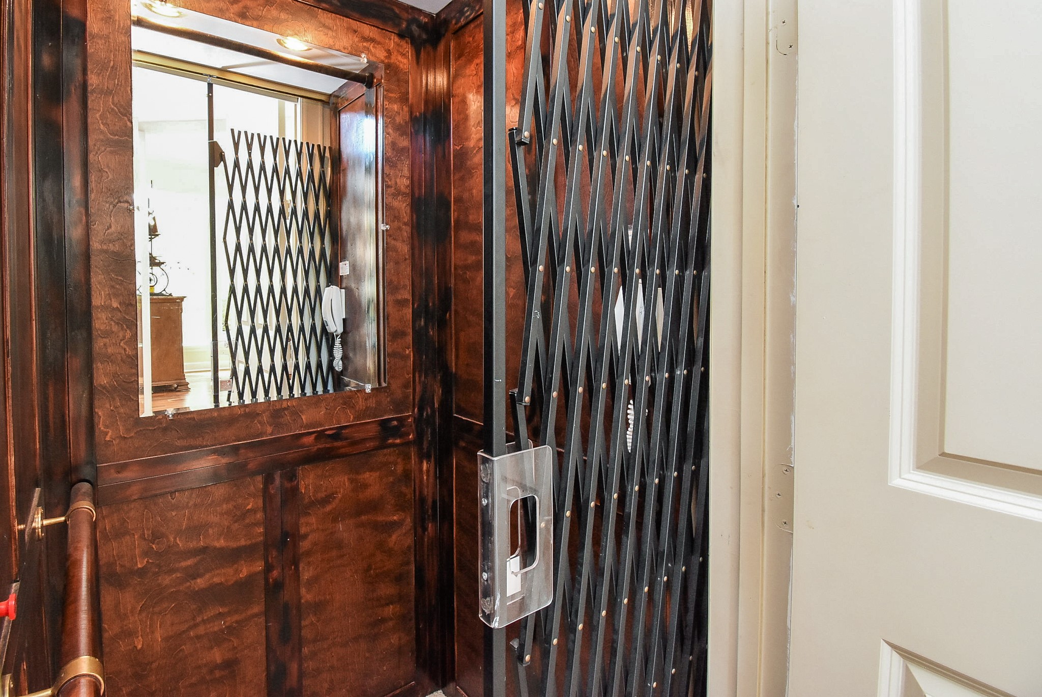 313 Harborside Circle Kemah, TX 77565 - Photo 8 of 35 a view of a elevator with wooden floor