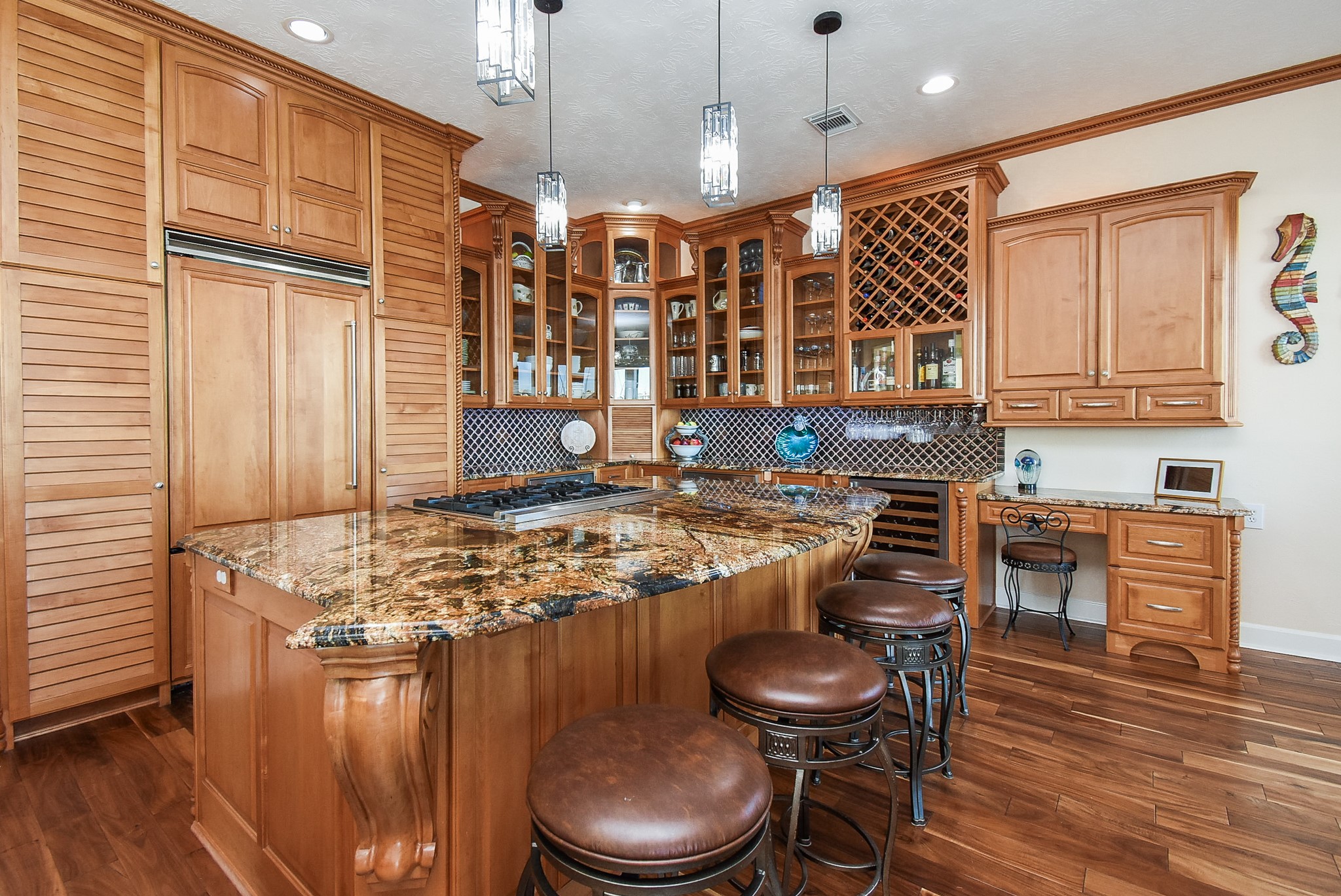 313 Harborside Circle Kemah, TX 77565 - Photo 10 of 35 a kitchen with stainless steel appliances granite countertop a stove a sink and a refrigerator