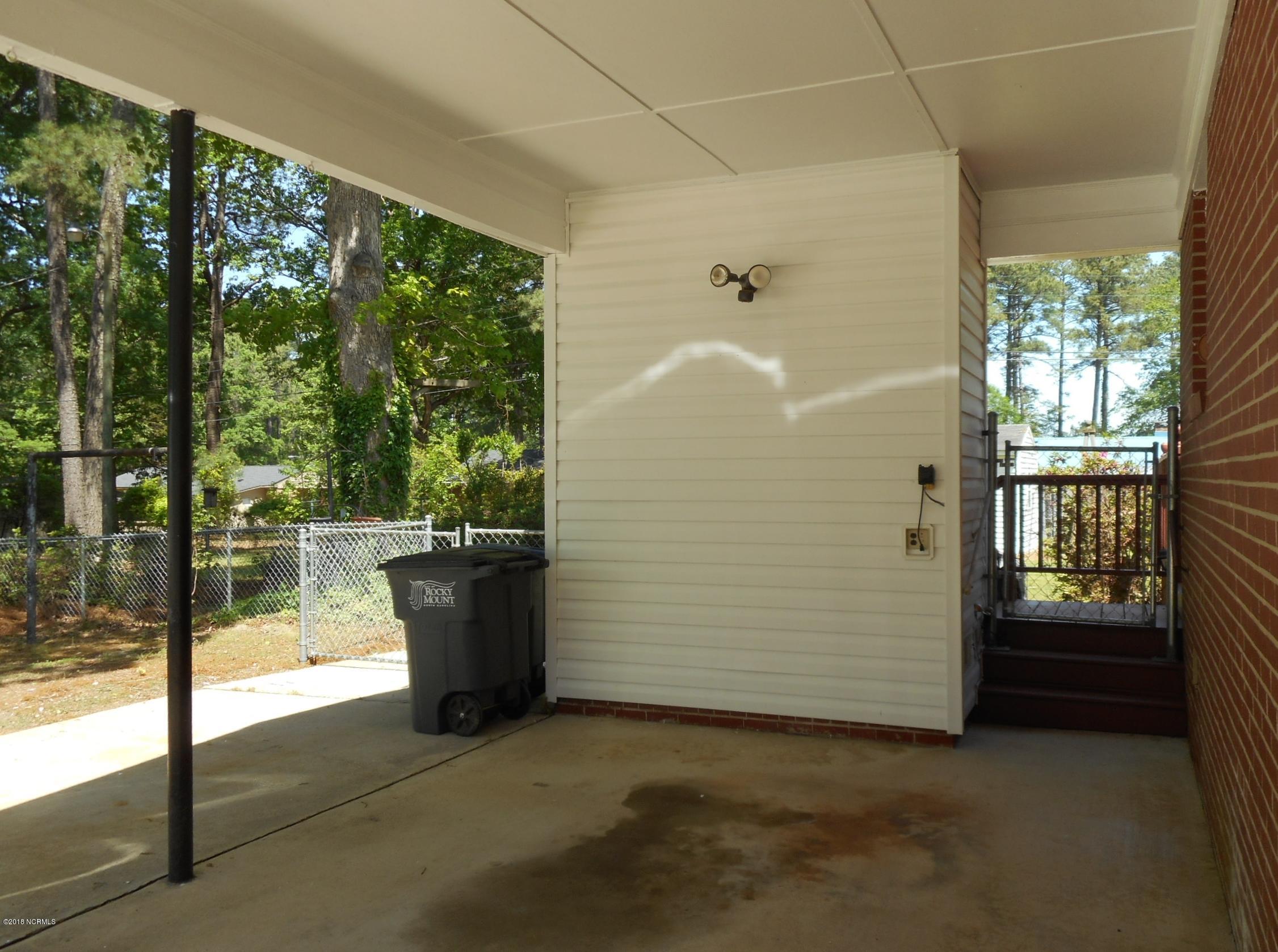 134 Falcon Road Rocky Mount, NC 27801 - Photo 3 of 31 Under the carport