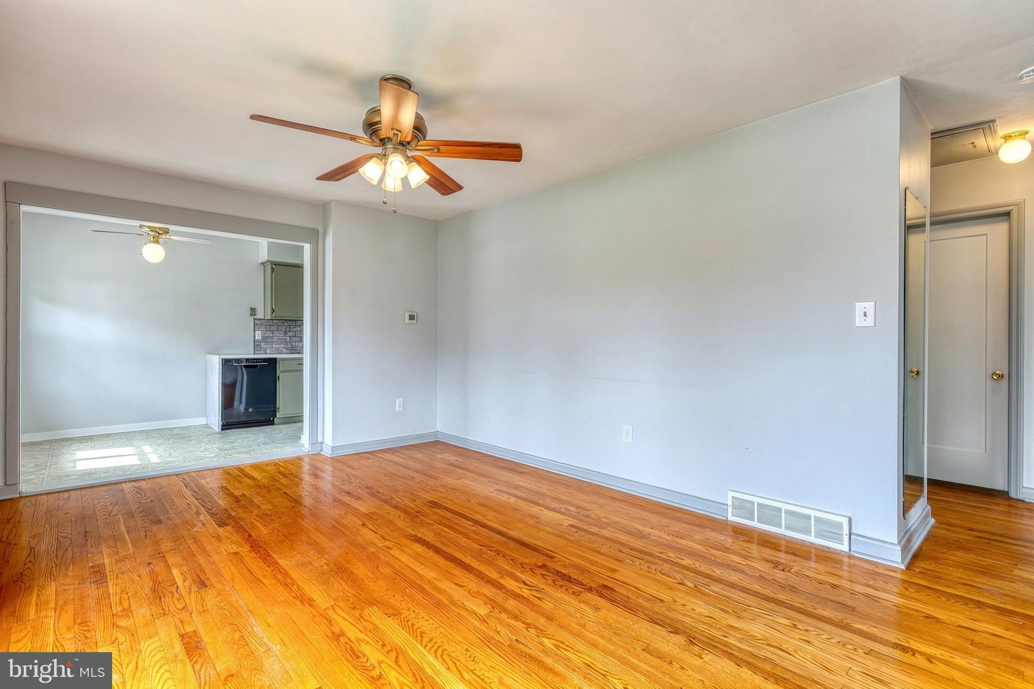 30 Lincoln Drive Hanover, PA 17331 - Photo 15 of 74 wooden floor in an empty room with a window
