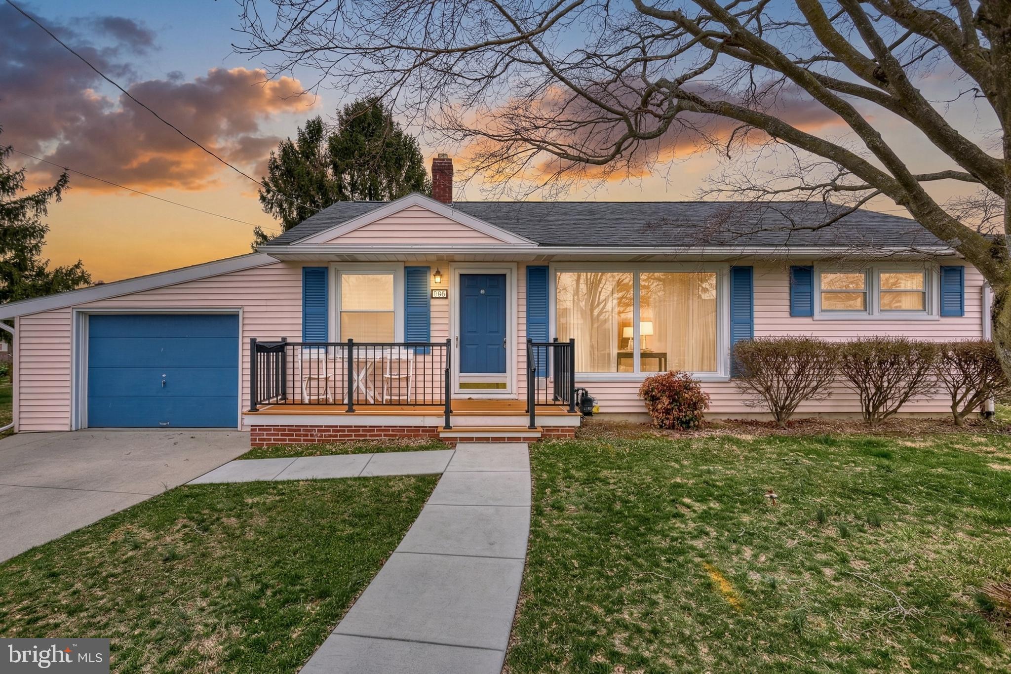 30 Lincoln Drive Hanover, PA 17331 - Photo 2 of 74 a front view of a house with a garden and yard