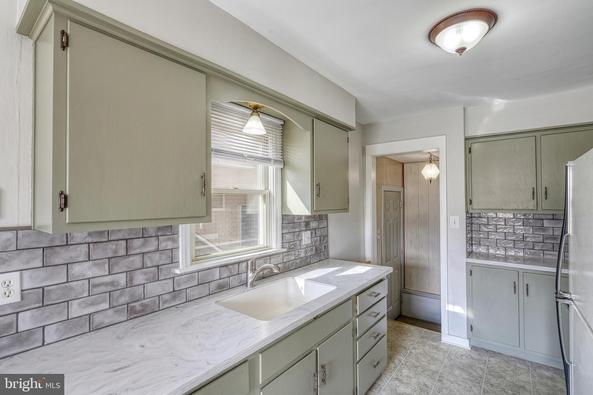 30 Lincoln Drive Hanover, PA 17331 - Photo 25 of 74 a bathroom with a granite countertop sink and a mirror
