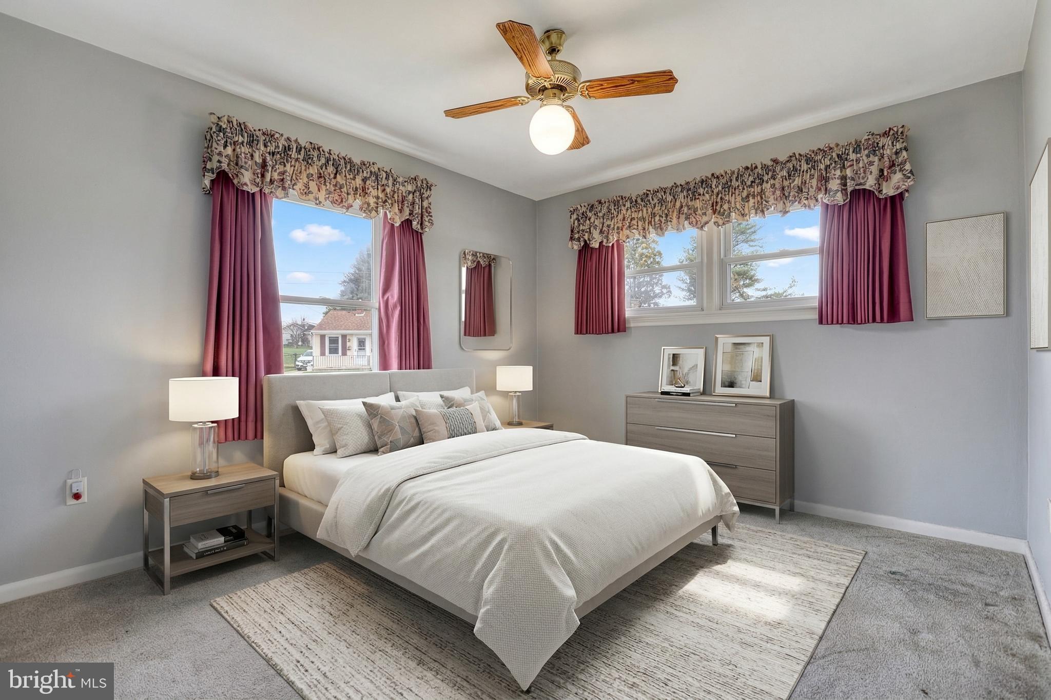 30 Lincoln Drive Hanover, PA 17331 - Photo 33 of 74 a bedroom with a bed and a chandelier