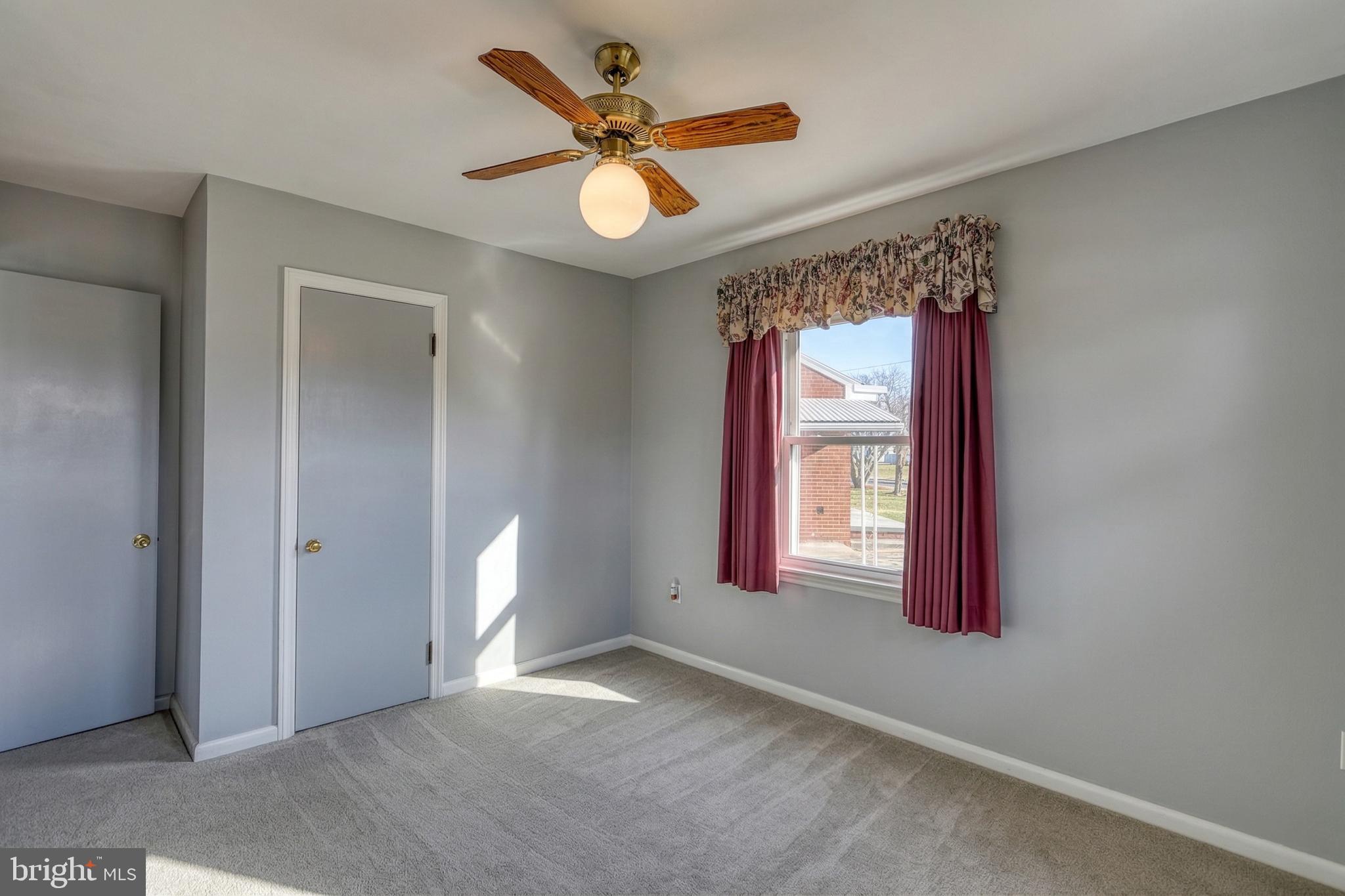 30 Lincoln Drive Hanover, PA 17331 - Photo 34 of 74 a view of a room with a ceiling fan and a window