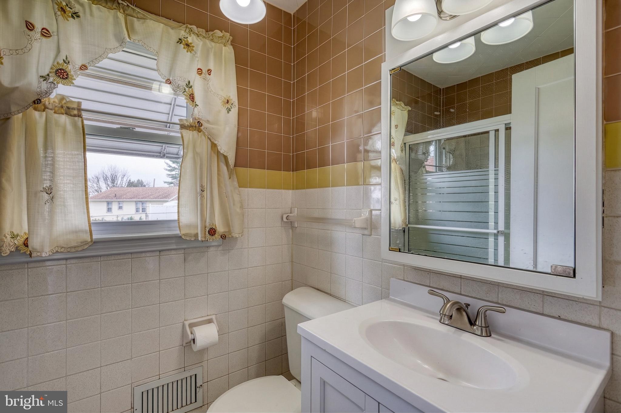 30 Lincoln Drive Hanover, PA 17331 - Photo 35 of 74 a bathroom with a sink and a mirror